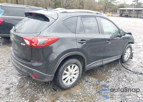 2013 Mazda Cx-5 Touring z USA, uszkodzony, nr VIN JM3KE2CEXD0139742